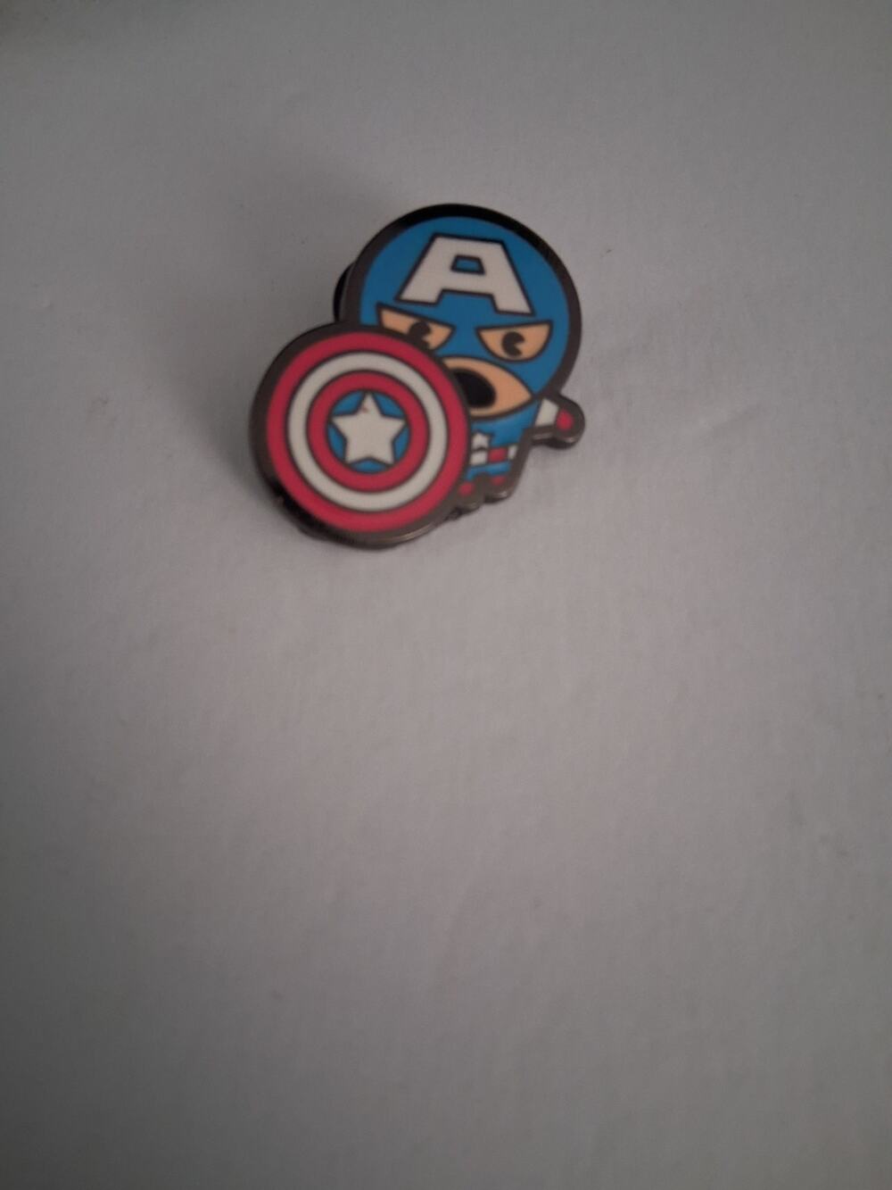 Disney trading pin.